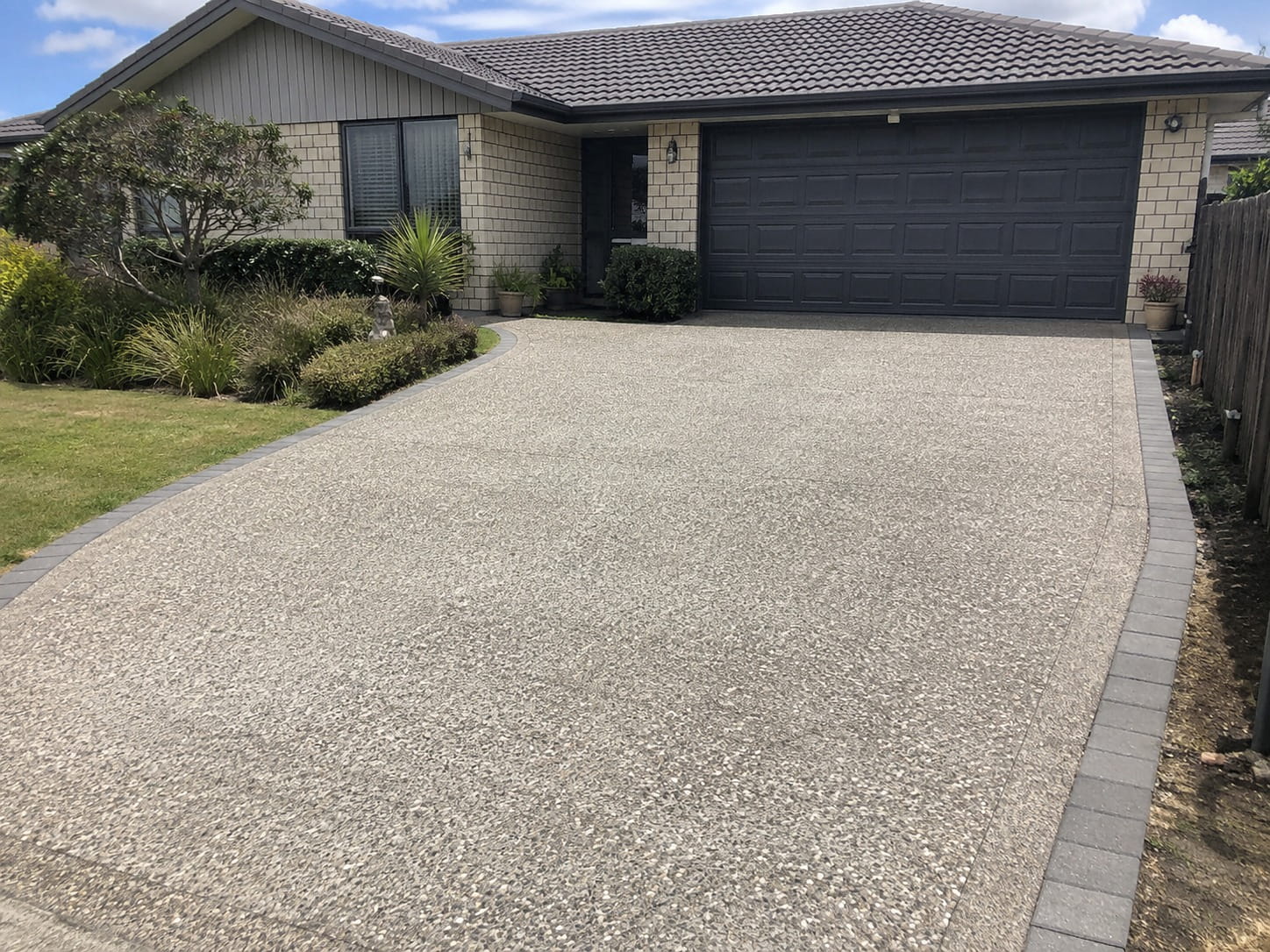 Concrete driveway repair team Auckland