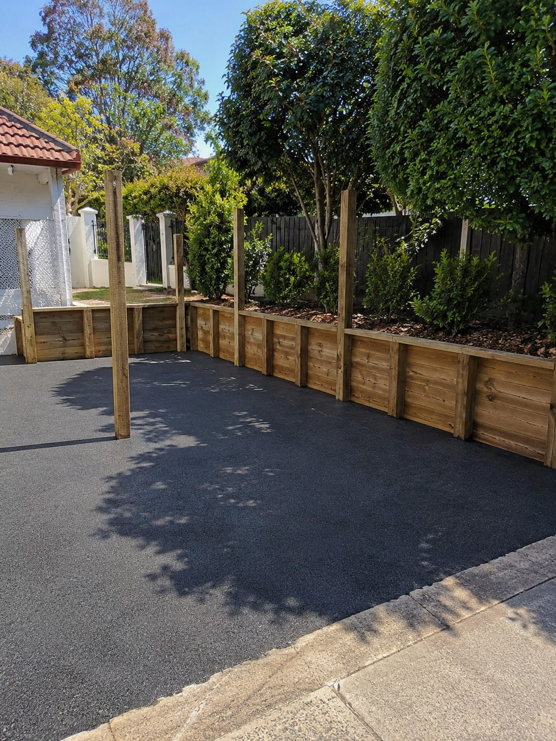Timber retaining wall and driveway installation Auckland